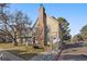 Charming townhouse featuring a brick chimney and well-maintained landscaping at 1731 S Blackhawk Way # A, Aurora, CO 80012