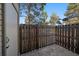 Private outdoor patio area with a wooden fence surrounding the space, perfect for relaxing outdoors at 1731 S Blackhawk Way # A, Aurora, CO 80012