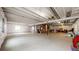 Unfinished basement featuring high ceilings, exposed ductwork, and bright natural light at 15402 E 113Th Pl, Commerce City, CO 80022