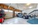 Spacious two-car garage with ample storage and natural light at 15402 E 113Th Pl, Commerce City, CO 80022