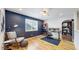 Stylish office space with a desk, comfortable chair, and decor elements at 15402 E 113Th Pl, Commerce City, CO 80022