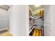 Walk-in pantry with built-in shelving provides ample storage space at 15402 E 113Th Pl, Commerce City, CO 80022