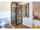 Modern bathroom with a frameless glass shower and stylish tile at 936 Eudora St # 102, Denver, CO 80220