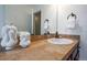 Clean bathroom with single vanity and updated fixtures at 936 Eudora St # 102, Denver, CO 80220