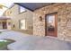 Exterior view of building, showcasing stonework and entryway at 936 Eudora St # 102, Denver, CO 80220