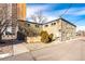 Exterior view of building with landscaping and walkway at 936 Eudora St # 102, Denver, CO 80220