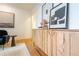 Living room features a modern wood cabinet and decor at 936 Eudora St # 102, Denver, CO 80220