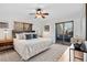 Main bedroom with king-size bed and private balcony at 936 Eudora St # 102, Denver, CO 80220