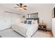 Main bedroom with king-size bed and ample closet space at 936 Eudora St # 102, Denver, CO 80220