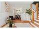 Well-decorated living room showcasing hardwood floors, modern furniture, and a view into the dining area at 187 S Pearl St, Denver, CO 80209