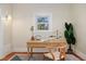 Bright, stylish office with warm wood floors, natural light and classic decor at 187 S Pearl St, Denver, CO 80209