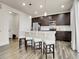Stylish kitchen with an island, stainless steel appliances, and pendant lighting at 9844 Truckee St, Commerce City, CO 80022