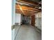 Unfinished basement space with exposed ceiling and concrete floor, ready for customization at 1878 S Cole St, Lakewood, CO 80228