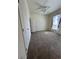 Bright bedroom with carpeting, ceiling fan, and ample natural light at 1878 S Cole St, Lakewood, CO 80228