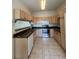 Updated kitchen features stainless steel appliances and abundant cabinet space at 1878 S Cole St, Lakewood, CO 80228