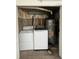 Convenient utility room with washer, dryer, and water heater at 1878 S Cole St, Lakewood, CO 80228