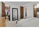 Spacious bedroom with large mirror, walk-in closet and attached bathroom at 8755 Chase Dr # 167, Arvada, CO 80003