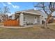 Charming home exterior featuring a welcoming porch, cozy seating, and well-maintained landscaping at 8755 Chase Dr # 167, Arvada, CO 80003