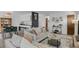 Open-concept living area featuring stylish furnishings, modern decor, and a seamless flow to the kitchen at 8755 Chase Dr # 167, Arvada, CO 80003