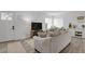 Bright living room with contemporary decor, offering a comfortable and stylish space for relaxation at 8755 Chase Dr # 167, Arvada, CO 80003