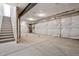 An unfinished basement with stairs and insulated walls awaiting personalization at 3282 N Catawba Way, Aurora, CO 80019