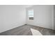 Bedroom with a view out the window, neutral walls and carpet at 3282 N Catawba Way, Aurora, CO 80019