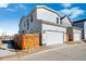 Charming two-story home with a two car garage and light exterior paint at 3282 N Catawba Way, Aurora, CO 80019