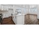 Modern kitchen featuring an island, stainless steel appliances, and an open layout at 3282 N Catawba Way, Aurora, CO 80019