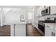 Modern kitchen featuring an island and stainless steel appliances at 3282 N Catawba Way, Aurora, CO 80019