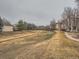 This exterior view features a wooden bridge and pathway at 5455 S Dover St # 101, Littleton, CO 80123