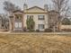 This exterior features two story with outdoor balconies and lawn at 5455 S Dover St # 101, Littleton, CO 80123