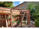 Custom outdoor cat enclosure featuring climbing platforms and natural elements for feline enrichment at 7344 S Sheephorn Mtn, Littleton, CO 80127