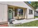 Inviting front entrance featuring a light green door with wreath, complemented by a bay window at 7830 W 90Th Ave # 67, Broomfield, CO 80021
