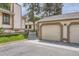 Detached garage with driveway access, offering convenient parking and storage solutions at 7830 W 90Th Ave # 67, Broomfield, CO 80021