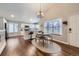 Open concept kitchen and dining area with stainless steel appliances and hardwood floors at 7830 W 90Th Ave # 67, Broomfield, CO 80021