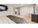 Bright main bedroom with wood floors, ensuite bathroom, walk-in closet, and large sliding-door closet at 7830 W 90Th Ave # 67, Broomfield, CO 80021