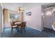 Bright dining room with round table and four chairs at 2898 S Patton Ct, Denver, CO 80236