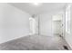 Simple bedroom with a window and an attached closet at 3355 N Coolidge Way, Aurora, CO 80019