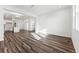 Open concept dining area with hardwood floors and kitchen access at 3355 N Coolidge Way, Aurora, CO 80019