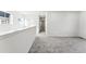 Upper level hallway with grey carpet and natural light at 3355 N Coolidge Way, Aurora, CO 80019