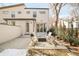 Cozy backyard with patio seating around a modern fire pit, perfect for outdoor entertaining at 4330 N Raleigh St, Denver, CO 80212