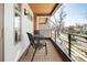 Outdoor balcony with a bistro set and neighborhood view at 4330 N Raleigh St, Denver, CO 80212