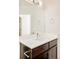 Bathroom featuring single vanity with quartz countertop and sleek finishes at 4330 N Raleigh St, Denver, CO 80212