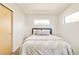 Cozy bedroom featuring a neutral color palette and natural light at 4330 N Raleigh St, Denver, CO 80212