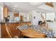 Open breakfast nook connects the kitchen with the rest of the home at 10795 Quail Creek E Dr, Parker, CO 80138