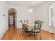 Formal dining room with hardwood floors is adjacent to the kitchen at 10795 Quail Creek E Dr, Parker, CO 80138