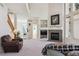 Spacious living room with a fireplace and open layout at 10795 Quail Creek E Dr, Parker, CO 80138