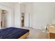 Large main bedroom with double bed and an ensuite bath at 10795 Quail Creek E Dr, Parker, CO 80138