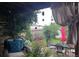 A relaxing outdoor view showing plants and a decorated back porch in a great neighborhood at 6731 Devinney St, Arvada, CO 80004