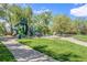 A playground features colorful play structures, slides, and pathways for engaging outdoor activities at 6731 Devinney St, Arvada, CO 80004